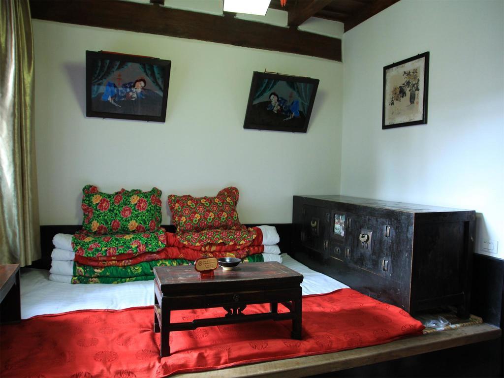 Pingyao Yiguan Folk Custom Inn Номер фото